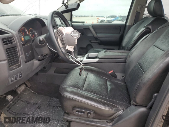 2013 Nissan Titan Pro-4X with VIN 1N6BA0ECXDN313300, listed as a Copart auction lot 46987125 with 174,432 mi miles and Salvage title. Bid and sale history available at DreamBid. Image 7.