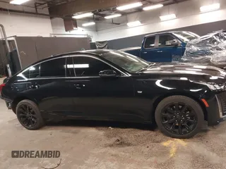 2023 Cadillac CT5 Luxury z VIN 1G6DX5RK7P0135813, wystawiony jako IAAI lot #42130722 z przebiegiem 20 738 mil mil oraz . Historia ofert i sprzedaży dostępna na DreamBid. Obrazek 14.
