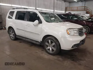 2012 Honda Pilot Touring with VIN 5FNYF4H9XCB035551, listed as a IAAI auction lot 41668893 with 1 mi miles. Bid and sale history available at carsss.com. Image 1.