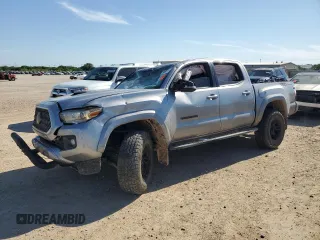 2018 Toyota Tacoma SR5 z VIN 5TFAZ5CN5JX056880, wystawiony jako Copart lot #56786565 z przebiegiem 78 453 mil mil oraz Szkoda całkowita • Salvage title. Historia ofert i sprzedaży dostępna na DreamBid. Obrazek 1.