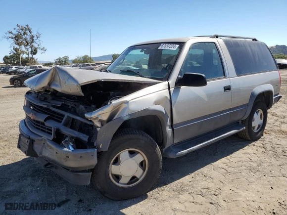 1999 Chevrolet Tahoe with VIN 3GNEK18R5XG184695, listed as a Copart auction lot 67697224 with 135,316 mi miles and Salvage Title. Bid and sale history available at carsss.com. Image 1.