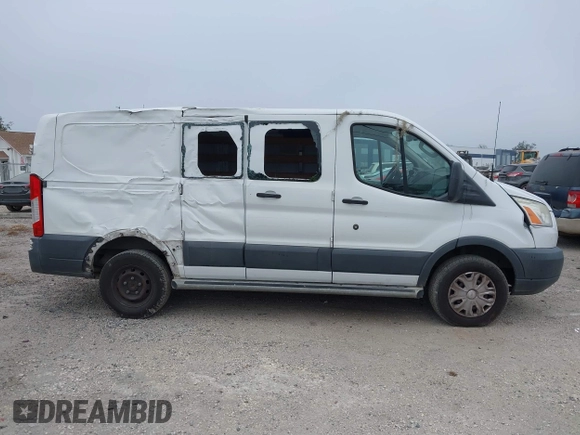 2016 Ford Transit Cargo z VIN 1FTYR1ZM3GKB36643, wystawiony jako IAAI lot #41127604 z przebiegiem 182 845 mil mil oraz . Historia ofert i sprzedaży dostępna na DreamBid. Obrazek 13.