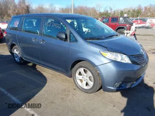 2014 Toyota Sienna L with VIN 5TDZK3DC0ES413970, listed as a IAAI auction lot 40870422 with 138,589 mi miles. Bid and sale history available at carsss.com. Image 1.