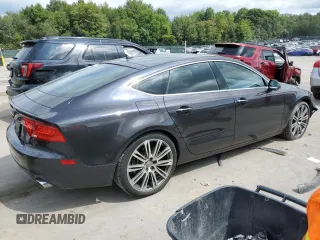 2015 Audi A7 3.0 TDI Premium Plus with VIN WAUWMAFC4FN002784, listed as a Copart auction lot 69375644 with 65,802 mi miles and Salvage Title. Bid and sale history available at carsss.com. Image 3.