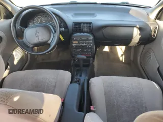 1999 Saturn SL with VIN 1G8ZK5274XZ367394, listed as a Copart auction lot 63863795 with 73,197 mi miles and Salvage title. Bid and sale history available at DreamBid. Image 8.