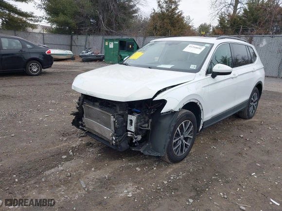 2020 Volkswagen Tiguan SE with VIN 3VV2B7AX0LM075033, listed as a IAAI auction lot 41310056 with 82,548 mi miles. Bid and sale history available at carsss.com. Image 17.