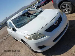 2009 Toyota Corolla with VIN JTDBL40E699058755, listed as a IAAI auction lot 42564996 with 211,526 mi miles and . Bid and sale history available at DreamBid. Image 13.