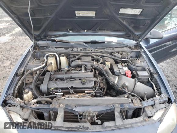 2000 Ford Escort ZX2 z VIN 3FAKP1131YR163051, wystawiony jako Copart lot #81164894 z przebiegiem 201 916 mil mil oraz Szkoda całkowita • Salvage title. Historia ofert i sprzedaży dostępna na DreamBid. Obrazek 11.