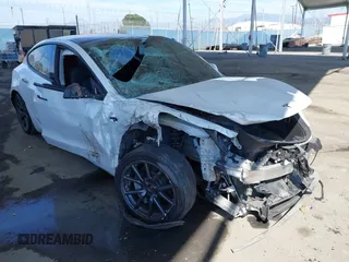 2018 Tesla Model 3 Long Range Battery z VIN 5YJ3E1EB3JF187543, wystawiony jako IAAI lot #41879169 z przebiegiem 74 144 mil mil oraz . Historia ofert i sprzedaży dostępna na DreamBid. Obrazek 1.