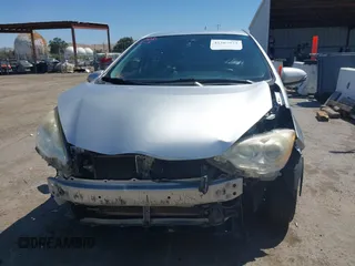 2013 Toyota Prius One z VIN JTDKDTB30D1041802, wystawiony jako IAAI lot #42207972 z przebiegiem 233 300 mil mil oraz . Historia ofert i sprzedaży dostępna na DreamBid. Obrazek 13.