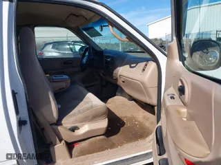 1999 Ford F-150 Work Series with VIN 1FTRX17W6XNB61503, listed as a IAAI auction lot 41627183 with 277,498 mi miles. Bid and sale history available at carsss.com. Image 5.