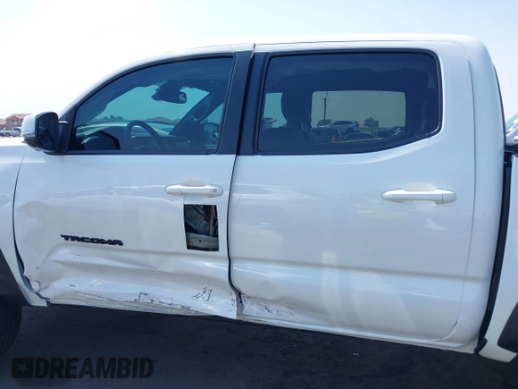 2023 Toyota Tacoma SR with VIN 3TMCZ5AN7PM630874, listed as a IAAI auction lot 40298041 with 8,635 mi miles and . Bid and sale history available at DreamBid. Image 14.