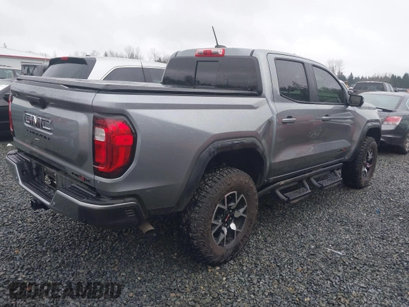 2024 GMC Canyon 4WD AT4X with VIN 1GTP6EEK9R1163595, listed as a IAAI auction lot 41568532 with 5,742 mi miles. Bid and sale history available at carsss.com. Image 4.