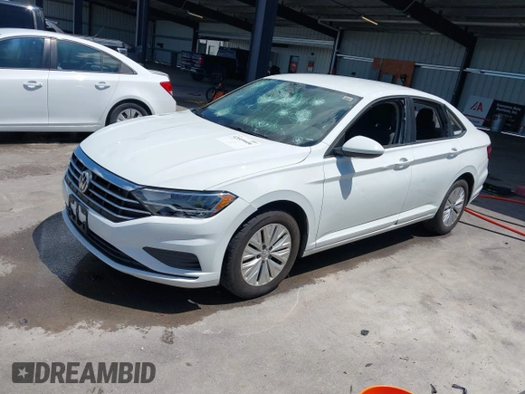 2019 Volkswagen Jetta S z VIN 3VWC57BU7KM200586, wystawiony jako IAAI lot #42609606 z przebiegiem 72 874 mil mil oraz . Historia ofert i sprzedaży dostępna na DreamBid. Obrazek 2.