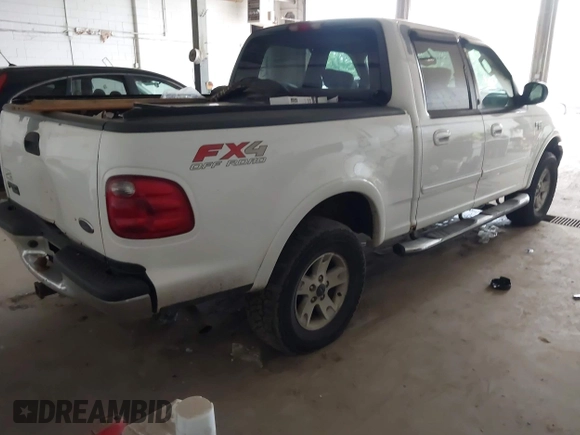 2003 Ford F-150 XLT with VIN 1FTRW08L03KB51627, listed as a IAAI auction lot 42497227 with 330,207 mi miles and . Bid and sale history available at DreamBid. Image 4.