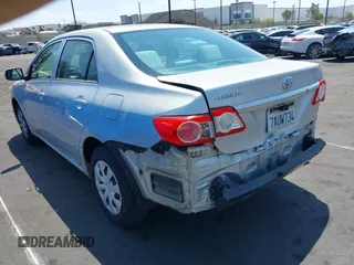 2013 Toyota Corolla L with VIN 5YFBU4EE3DP207633, listed as a IAAI auction lot 42131218 with 89,899 mi miles and . Bid and sale history available at DreamBid. Image 3.