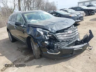 2017 Cadillac XT5 Luxury FWD z VIN 1GYKNBRS5HZ277786, wystawiony jako IAAI lot #41896038 z przebiegiem 103 790 mil mil oraz . Historia ofert i sprzedaży dostępna na DreamBid. Obrazek 1.