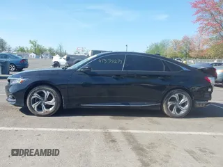 2020 Honda Accord EX-L with VIN 1HGCV2F57LA004141, listed as a IAAI auction lot 42136007 with 105,352 mi miles and . Bid and sale history available at DreamBid. Image 14.