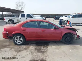 2003 Dodge Stratus SXT with VIN 1B3EL46X13N557744, listed as a IAAI auction lot 41689194 with 206,410 mi miles. Bid and sale history available at carsss.com. Image 14.