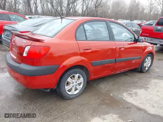 2009 Kia Rio SX with VIN KNADE223796561406, listed as a IAAI auction lot 41650749 with 100,041 mi miles. Bid and sale history available at carsss.com. Image 4.
