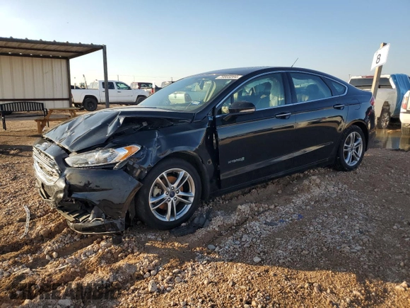 2016 Ford Fusion Titanium Hybrid with VIN 3FA6P0RU6GR356609, listed as a Copart auction lot 79803204 with 69,619 mi miles and Salvage Title. Bid and sale history available at carsss.com. Image 1.
