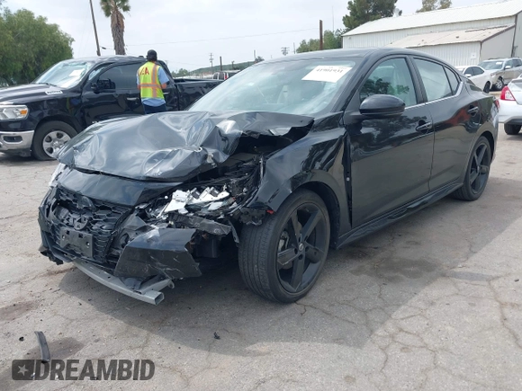 2022 Nissan Sentra SR z VIN 3N1AB8DV3NY295100, wystawiony jako IAAI lot #41901931 z przebiegiem 40 811 mil mil oraz . Historia ofert i sprzedaży dostępna na DreamBid. Obrazek 17.