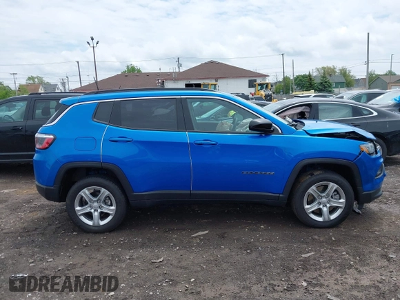 2023 Jeep Compass Latitude z VIN 3C4NJDBN6PT513561, wystawiony jako IAAI lot #42344712 z przebiegiem 4 873 mil mil oraz . Historia ofert i sprzedaży dostępna na DreamBid. Obrazek 13.