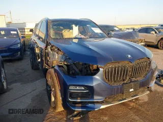 2021 BMW X5 sDrive40i with VIN 5UXCR4C01M9F02587, listed as a IAAI auction lot 41111144 with 23,844 mi miles. Bid and sale history available at carsss.com. Image 1.