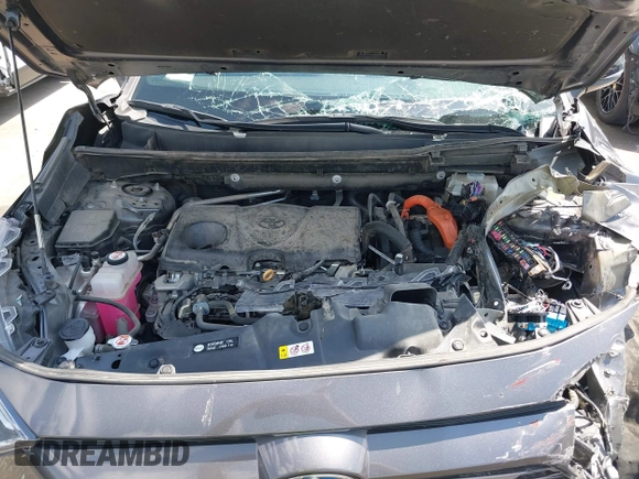 2021 Toyota RAV4 Hybrid XSE with VIN 2T3E6RFV8MW026973, listed as a IAAI auction lot 42052289 with 94,857 mi miles and . Bid and sale history available at DreamBid. Image 10.