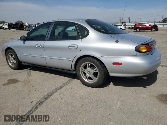 1996 Ford Taurus GL with VIN 1FALP52U7TA299996, listed as a Copart auction lot 53387685 with 175,029 mi miles and Salvage title. Bid and sale history available at DreamBid. Image 2.