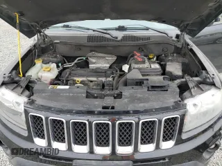 2016 Jeep Compass Sport z VIN 1C4NJCBA6GD705687, wystawiony jako Copart lot #60283815 z przebiegiem 166 920 mil mil oraz Szkoda całkowita • Salvage title. Historia ofert i sprzedaży dostępna na DreamBid. Obrazek 11.
