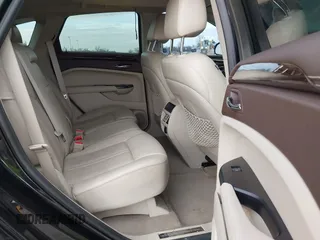 2013 Cadillac SRX Performance Collection with VIN 3GYFNHE34DS595277, listed as a IAAI auction lot 41618126 with 118,141 mi miles. Bid and sale history available at carsss.com. Image 8.