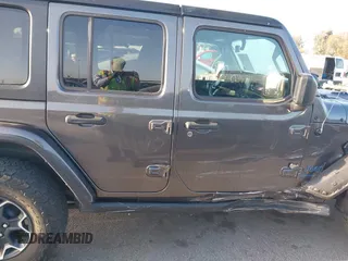 2023 Jeep Wrangler Rubicon with VIN 1C4JJXR67PW662277, listed as a IAAI auction lot 41950065 with 35,714 mi miles and . Bid and sale history available at DreamBid. Image 13.