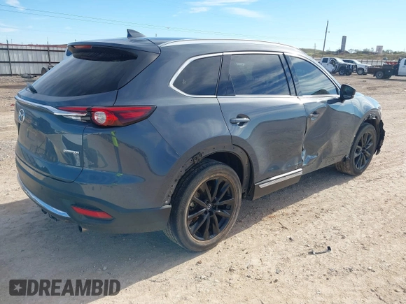 2022 Mazda CX-9 Grand Touring with VIN JM3TCBDY6N0613996, listed as a IAAI auction lot 41018105 with 58,110 mi miles. Bid and sale history available at carsss.com. Image 4.