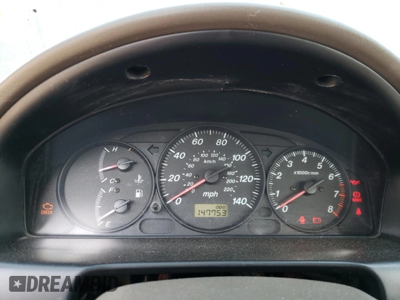 2003 Mazda Protege DX with VIN JM1BJ226231214537, listed as a Copart auction lot 54448615 with 147,753 mi miles and Salvage Title. Bid and sale history available at DreamBid. Image 9.