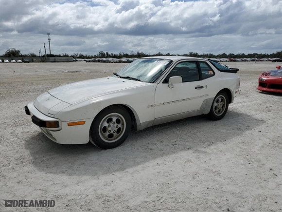 1986 Porsche 944 with VIN WP0AA0948GN453769, listed as a Copart auction lot 76462054 with 264,439 mi miles and Salvage Title. Bid and sale history available at carsss.com. Image 1.