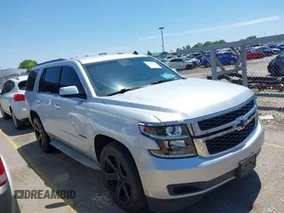 2015 Chevrolet Tahoe LT with VIN 1GNSCBKC9FR111001, listed as a IAAI auction lot 42440624 with 128,087 mi miles and . Bid and sale history available at DreamBid. Image 1.