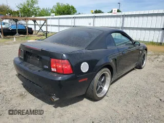 2004 Ford Mustang Standard with VIN 1FAFP40464F100368, listed as a Copart auction lot 51221794 with 174,711 mi miles and Salvage Title. Bid and sale history available at carsss.com. Image 3.