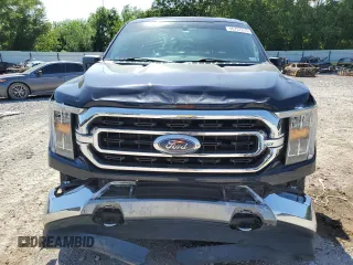 2021 Ford F-150 XL with VIN 1FTFW1E5XMFA47980, listed as a Copart auction lot 56737215 with 63,781 mi miles and Salvage title. Bid and sale history available at DreamBid. Image 5.