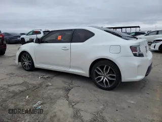 2016 Scion tC with VIN JTKJF5C73GJ019812, listed as a Copart auction lot 84228844 with 153,692 mi miles and Salvage Title. Bid and sale history available at carsss.com. Image 2.