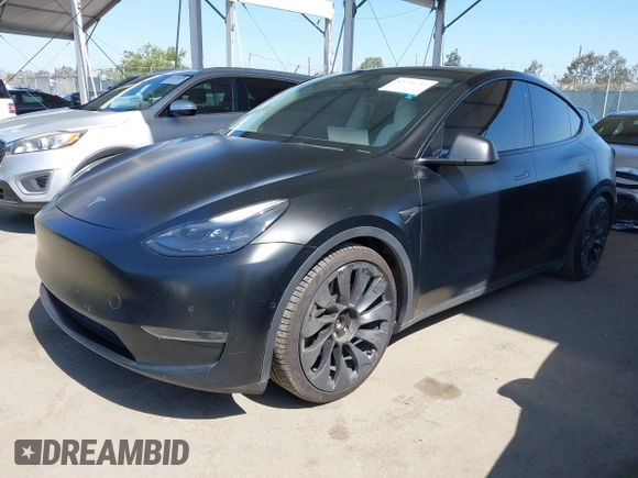 2022 Tesla Model Y Performance z VIN 7SAYGDEF0NF491586, wystawiony jako IAAI lot #42276747 z przebiegiem 117 203 mil mil oraz . Historia ofert i sprzedaży dostępna na DreamBid. Obrazek 21.