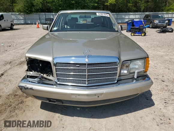 1991 Mercedes-Benz 560 with VIN WDBCA39E9MA599487, listed as a Copart auction lot 51921915 with 59,132 mi miles and Salvage Title. Bid and sale history available at DreamBid. Image 5.