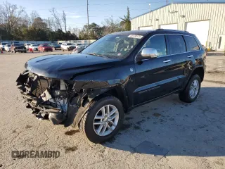 2017 Jeep Grand Cherokee Overland with VIN 1C4RJFCG4HC865483, listed as a Copart auction lot 43138375 with 71,884 mi miles and Salvage Title. Bid and sale history available at carsss.com. Image 1.