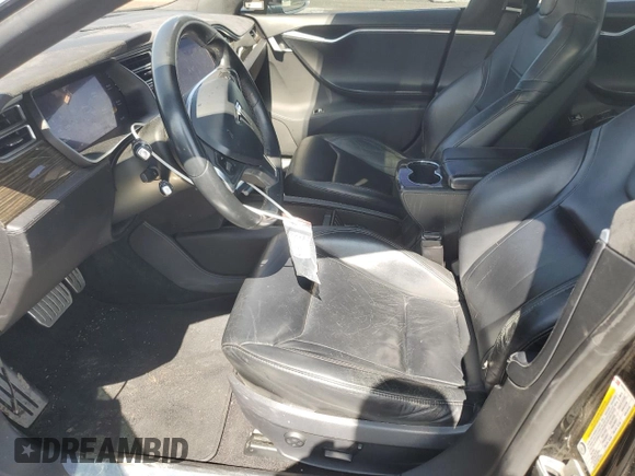 2014 Tesla Model S P85D with VIN 5YJSA1H28EFP63765, listed as a Copart auction lot 50241385 with 100,274 mi miles and Salvage Title. Bid and sale history available at DreamBid. Image 7.