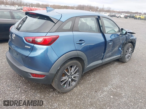 2018 Mazda CX-3 Touring with VIN JM1DKFC78J0322460, listed as a IAAI auction lot 41730662 with 58,841 mi miles. Bid and sale history available at carsss.com. Image 4.