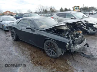 2017 Dodge Challenger R/T z VIN 2C3CDZBT1HH568931, wystawiony jako IAAI lot #41474296 z przebiegiem 110 965 mil mil oraz . Historia ofert i sprzedaży dostępna na DreamBid. Obrazek 1.