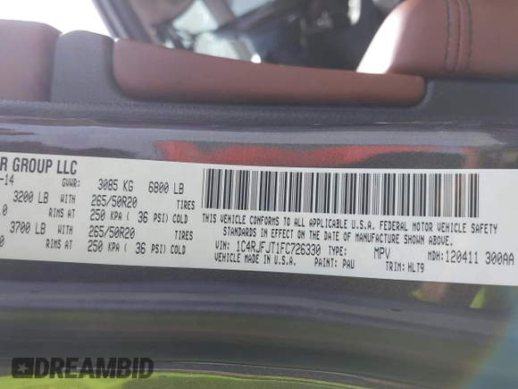 2015 Jeep Grand Cherokee Summit with VIN 1C4RJFJT1FC726330, listed as a IAAI auction lot 41781127 with 138,425 mi miles. Bid and sale history available at carsss.com. Image 9.