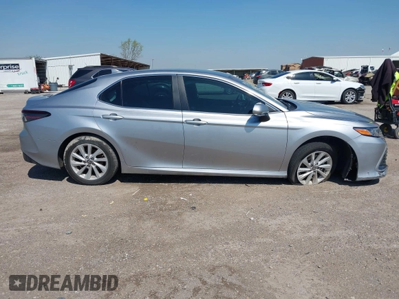 2024 Toyota Camry LE z VIN 4T1R11AKXRU883388, wystawiony jako IAAI lot #41977607 z przebiegiem 8 784 mil mil oraz . Historia ofert i sprzedaży dostępna na DreamBid. Obrazek 13.