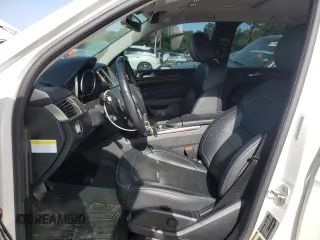 2014 Mercedes-Benz M 350 with VIN 4JGDA5JB0EA283475, listed as a Copart auction lot 57140295 with 105,777 mi miles and Salvage title. Bid and sale history available at DreamBid. Image 7.