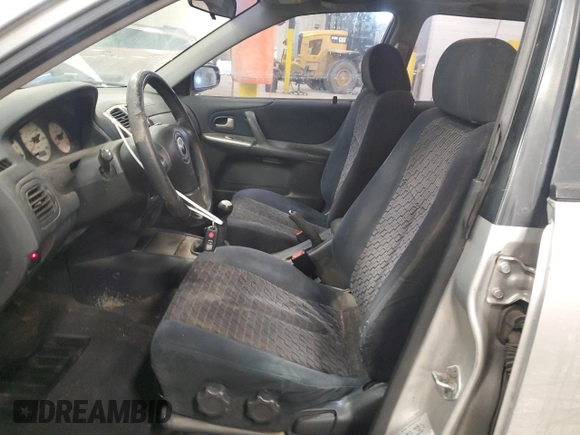 2002 Mazda Protege z VIN JM1BJ245X21565456, wystawiony jako Copart lot #43756385 z przebiegiem 195 892 mil mil oraz Szkoda całkowita • Salvage title. Historia ofert i sprzedaży dostępna na DreamBid. Obrazek 7.